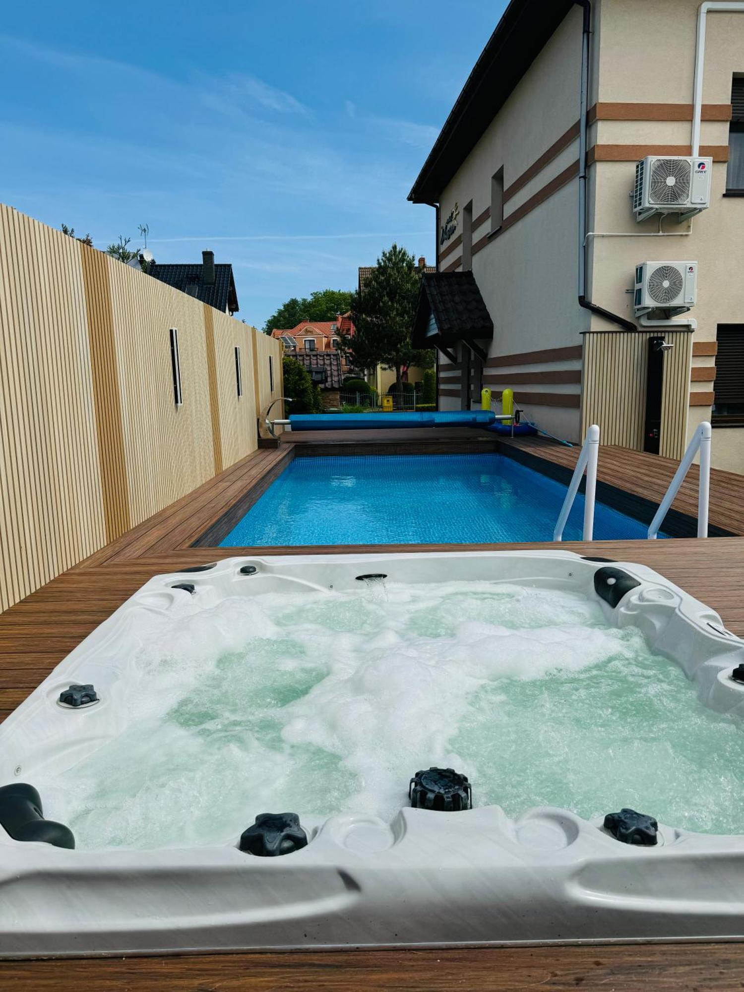 Pokoje Goscinne Nad Zalewem Swim Spa ミエンジボジェ エクステリア 写真